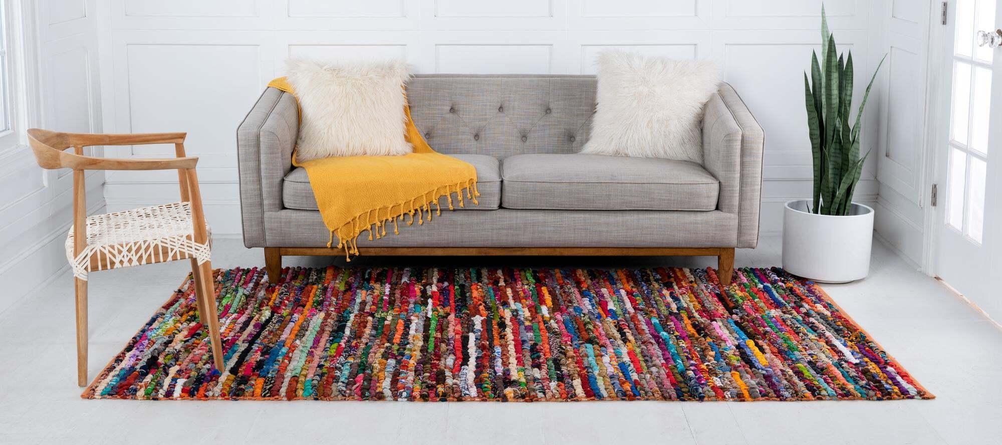 https://www.casaone.com/cdn/shop/files/braided-chindi-geometric-rectangular-8x10-rug-multi-and-orange-unique-loom-casaone-4.jpg?v=1686650649