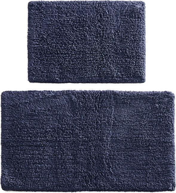 https://www.casaone.com/cdn/shop/files/ritzy-bath-rug-navy-olliix-com-casaone-2.jpg?v=1686664274