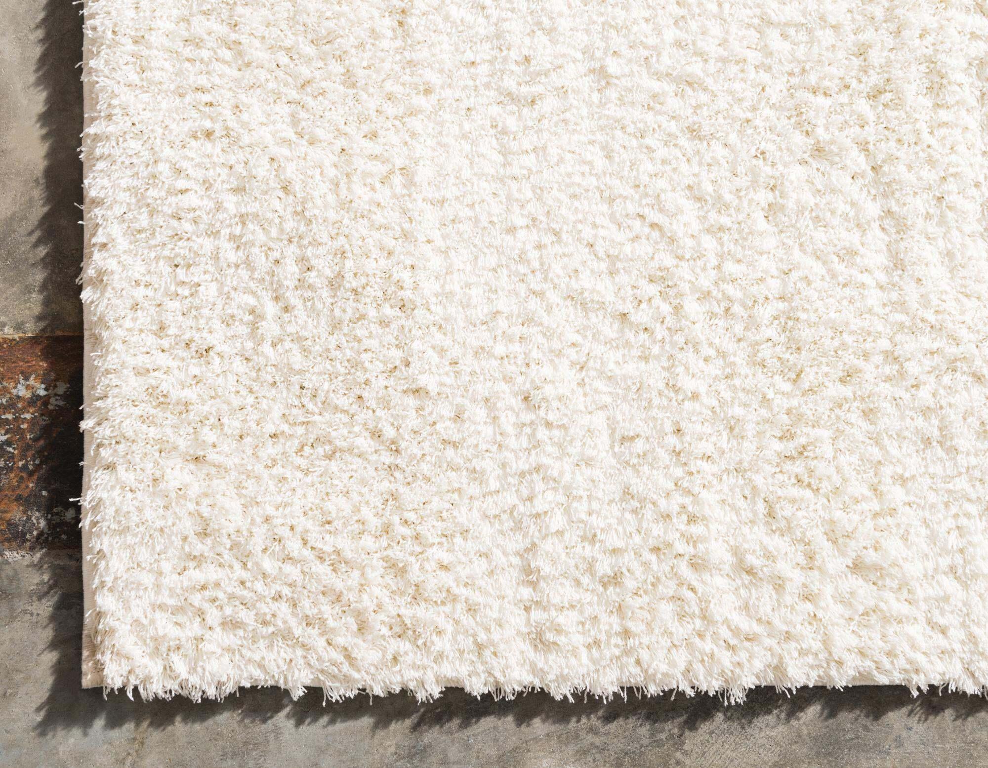 https://www.casaone.com/cdn/shop/files/studio-solid-shag-solid-rectangular-8x10-rug-white-unique-loom-casaone-9.jpg?v=1683879064