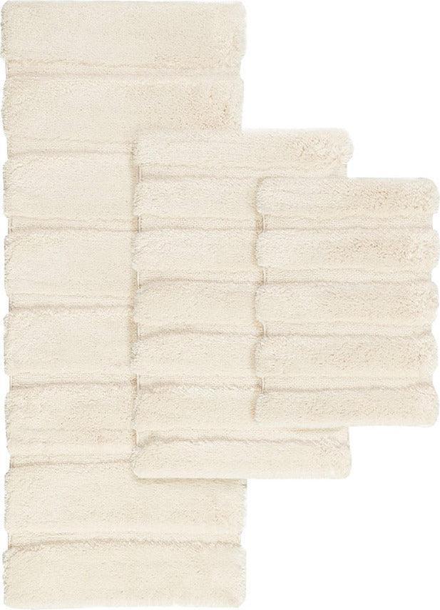 https://www.casaone.com/cdn/shop/files/tufted-pearl-channel-24-bath-rug-wheat-olliix-com-casaone-2.jpg?v=1686664119