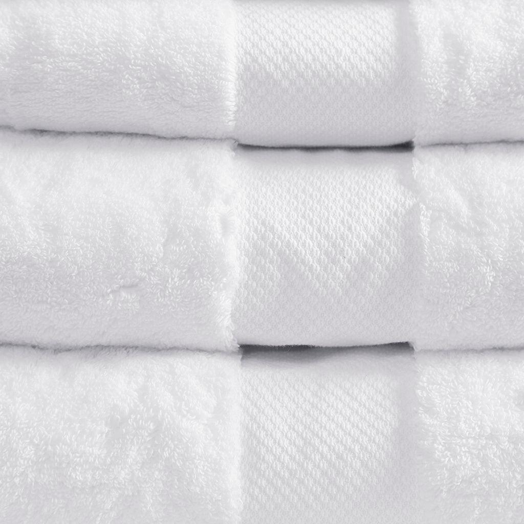 https://www.casaone.com/cdn/shop/files/turkish-bath-towel-white-olliix-com-casaone-3.jpg?v=1686664083