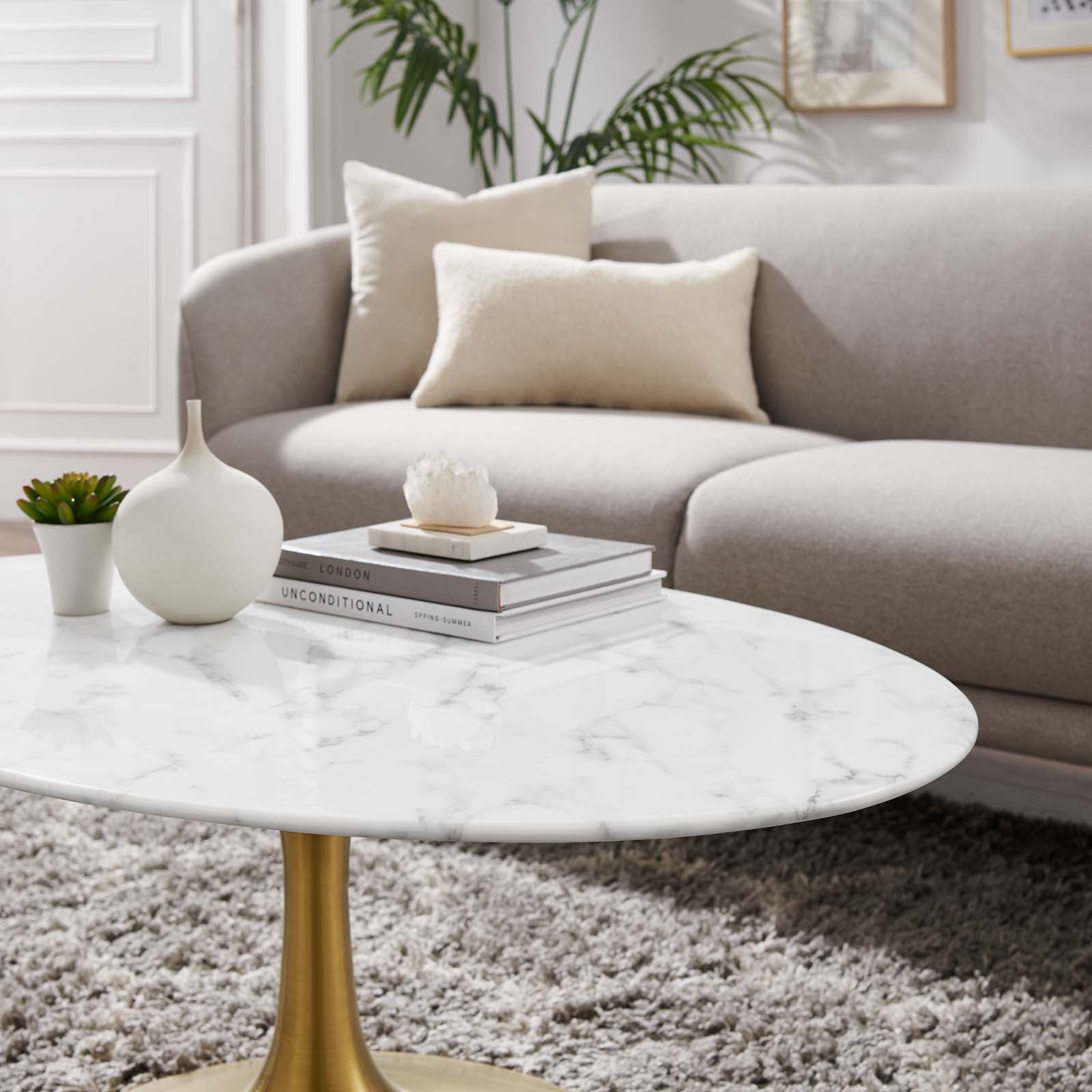 23% off Laurent Oval White Marble Coffee Table with Angled Base